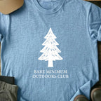 Printify T-Shirt Light Blue / S Bare Minimum Outdoor Club T-Shirt Bare Minimum Outdoor Club T-Shirt